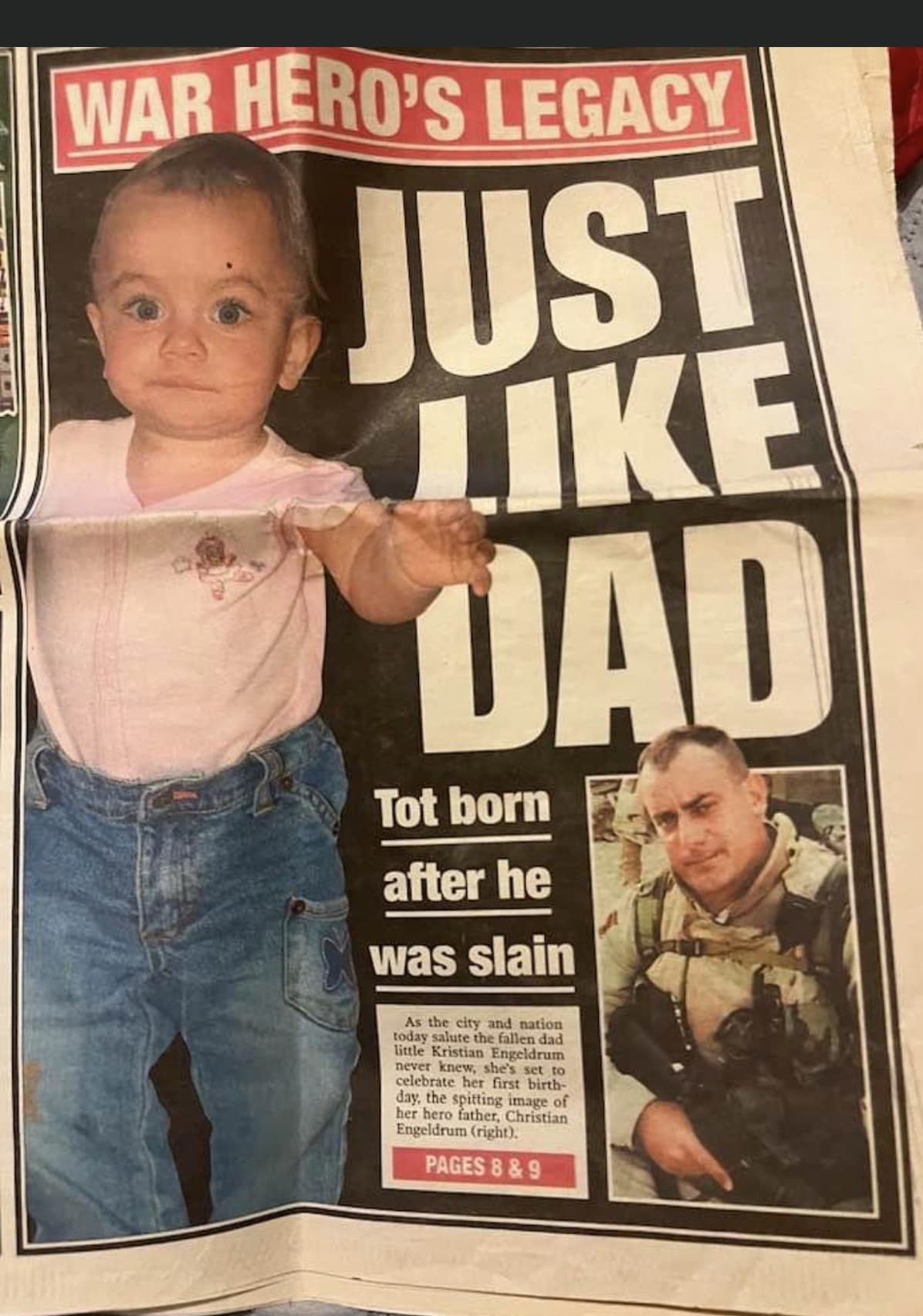 Newspaper page headlined War Hero's Legacy - Just Like Dad showing a toddler in a pink shirt and jeans beside an inset photo of her father in uniform, with the subhead Tot born after he was slain.