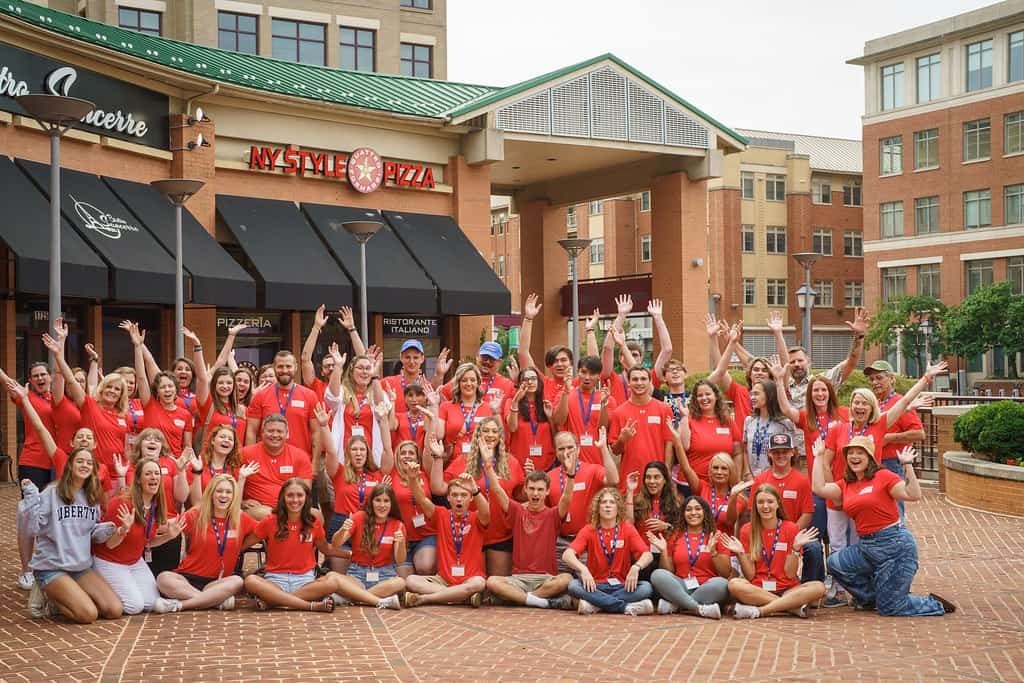 NGS Scholars and families gathered together, smiling, at the annual BootCamp in Washington, DC
