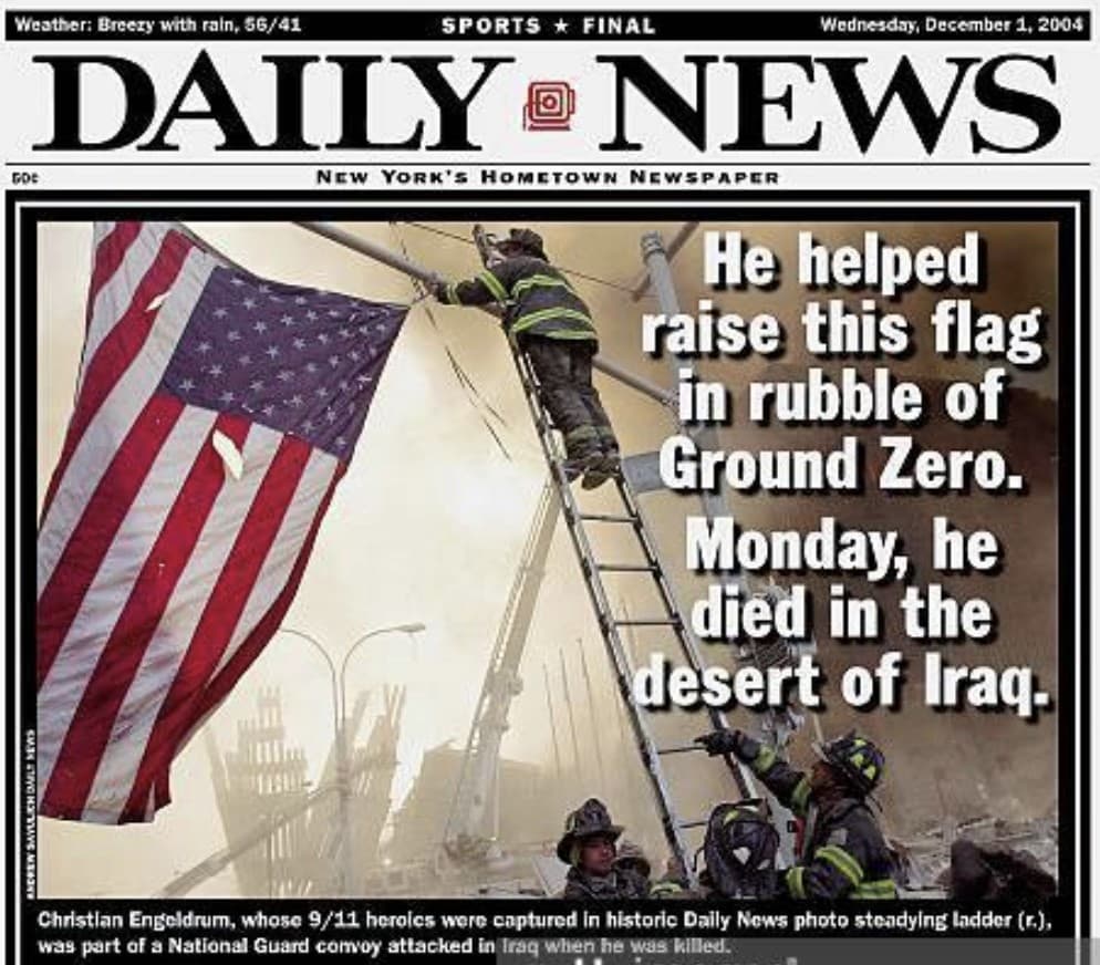 Daily News front page photograph of firefighters raising an American flag on a ladder amid the smoke and rubble of Ground Zero, headlined: He helped raise this flag in rubble of Ground Zero. Monday, he died in the desert of Iraq.